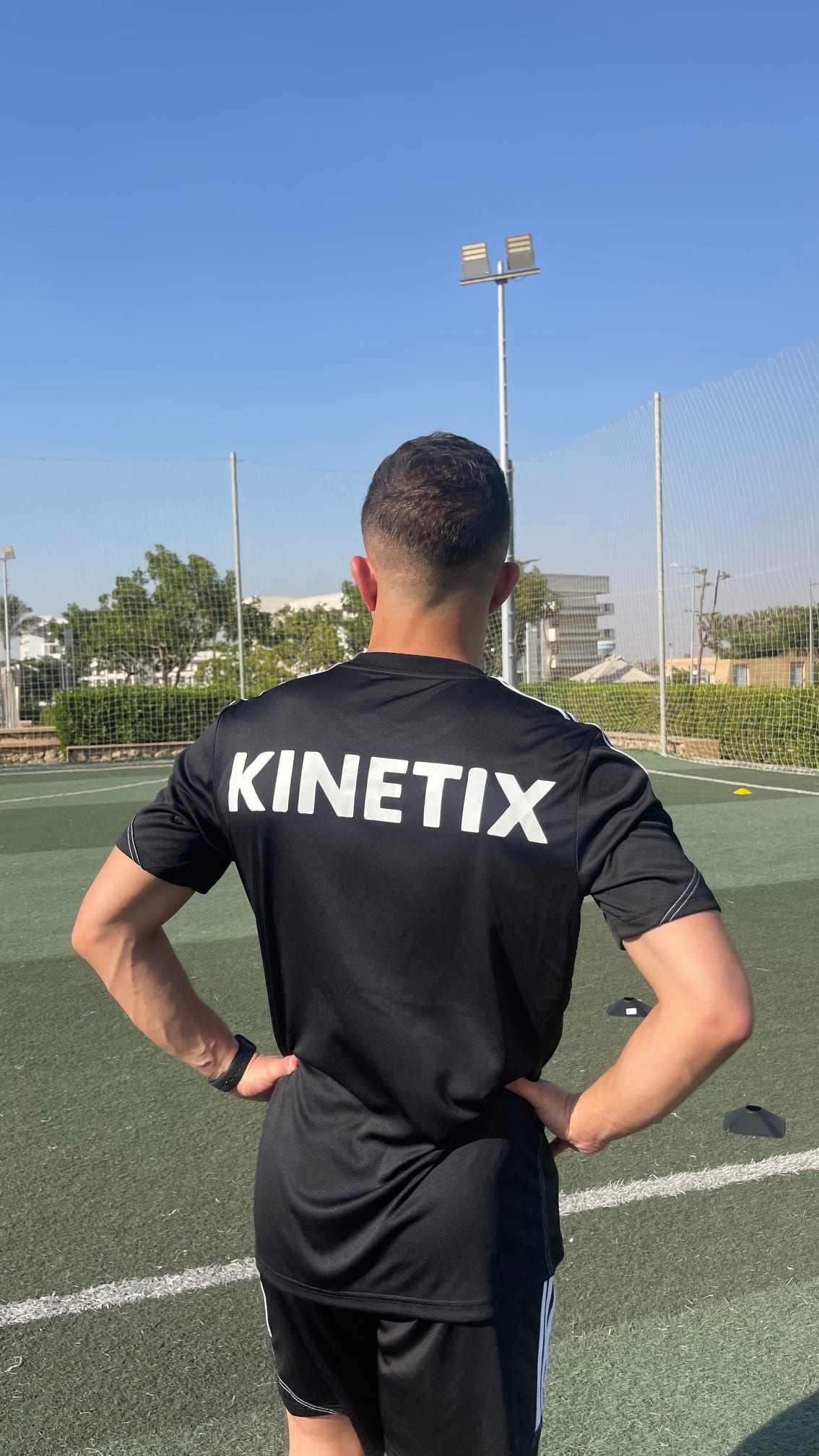 Kinetix coach on the pitch